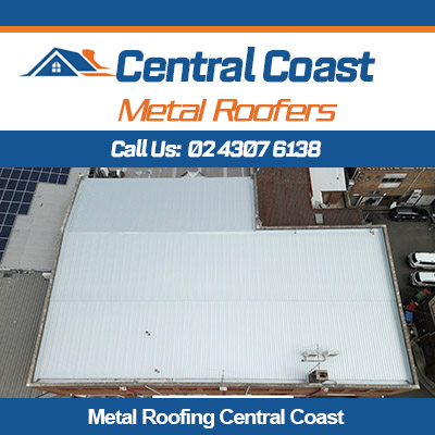 White metal roof replacement completed on commercial building in Central Coast for flat roofing system